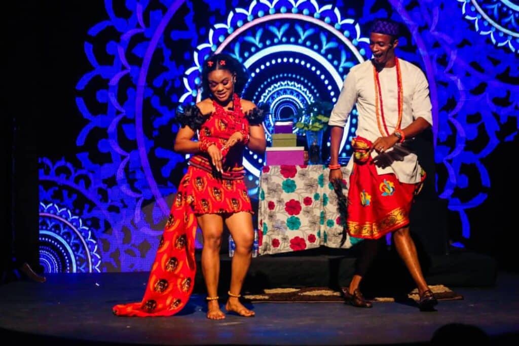 A couple on stage in House of Naira